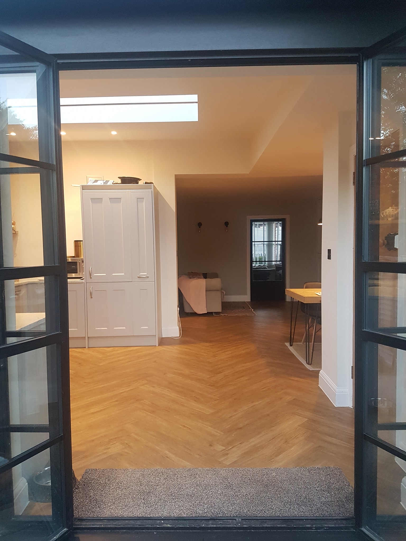 Open plan herringbone floor interior after extension completed