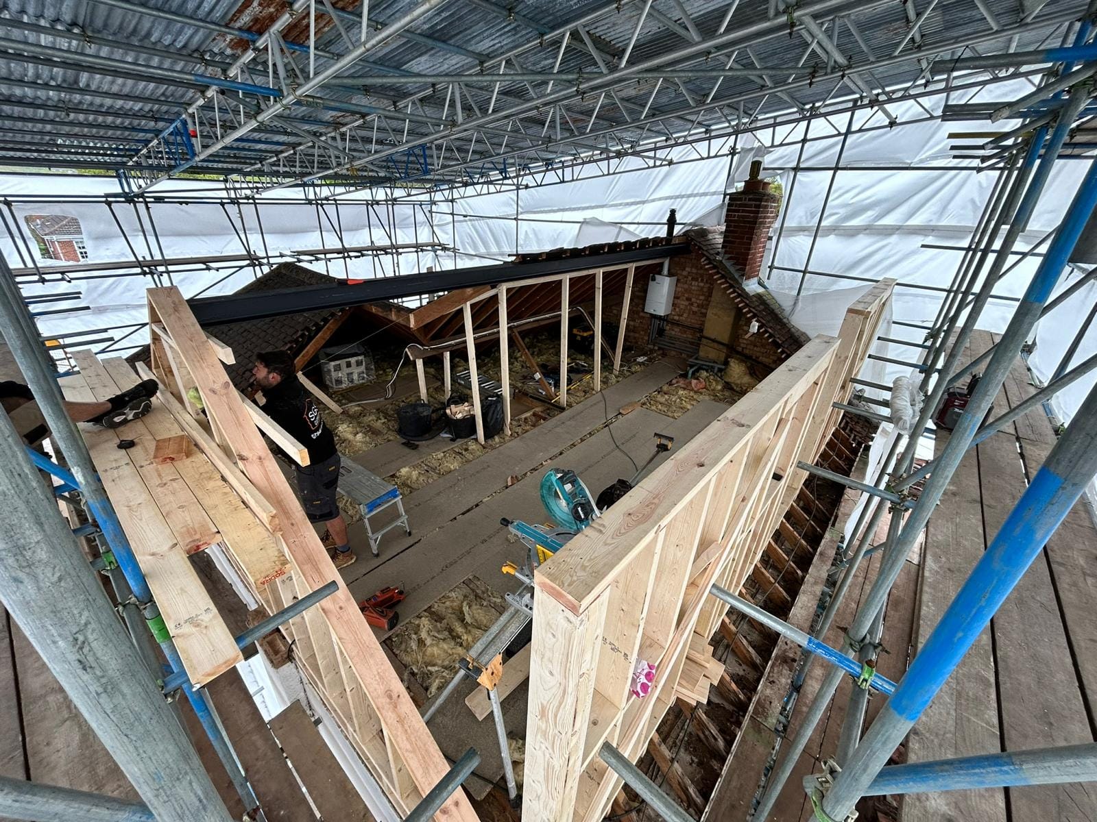 Sam working on roof structure during loft conversion